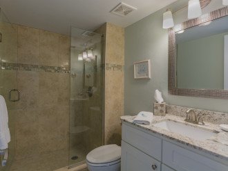 Step into the remodeled master bath. Large counter space for your make up or shaving gear.