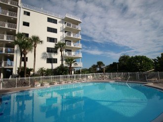 This corner condo provides beach and pool views from the balcony! Convenient for watching the kids play.