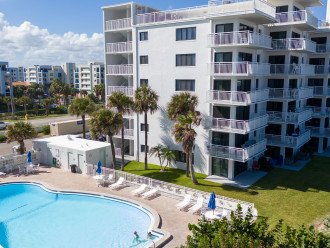 Large balcony with corner oceanfront views and pool access! #1