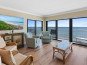 Beautiful corner unit with oceanfront views and wrap around balcony! #1