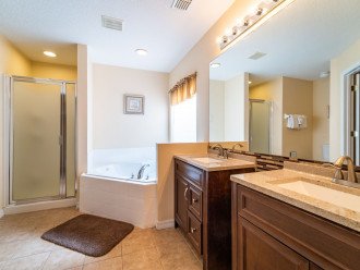 Bathroom with walk-in shower and bath