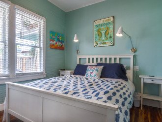 Bright and airy Queen Bedroom ready for family or guests to stay.