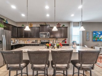 Kitchen with 4 counter stools