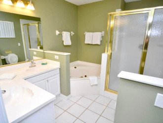 Separate shower and bath adjoining the master suite on the first floor