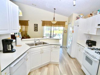 Fully equipped kitchen with access to the pool area