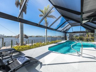 Vacation rental with heated pool on the water