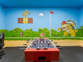 Mario-Themed Game room with Nintendo, Foosball table & Street Fighter Arcade