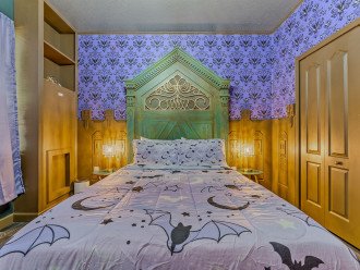Haunted Mansion Room with a Queen Size Bed and Makeup area