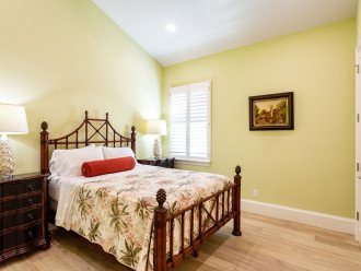 Bedroom Suite #2 with queen bed, with large closet and en-suite private bathroom.