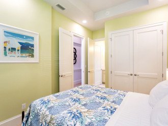 Bedroom Suite #1 with queen bed, large closet and adjoining bathroom.