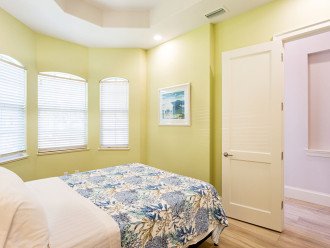 Bedroom Suite #1 with queen bed, large closet and adjoining bathroom.