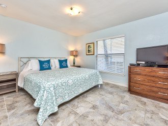 Master Bedroom with King Bed and Flat Screen TV;