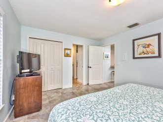 Master Bedroom with King Bed and Flat Screen TV;