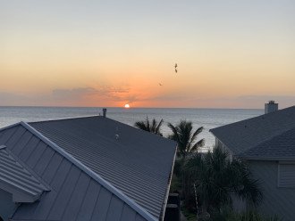 Sunsets from our balcony , pool deck or from the beach...your choice