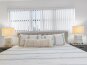 Experience ultimate comfort in the master bedroom with a luxurious king bed featuring a 12" memory foam mattress. Perfect for a restful night's sleep, this inviting bed ensures you wake up refreshed and ready to enjoy your getaway.