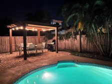 Come relax at the Coral Cove - beautifully decorated pool house gem