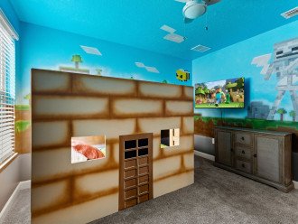 There are two twin bunk beds, 57" Roku Smart TV, large closet, console, and STEM-based fort building cardboards.