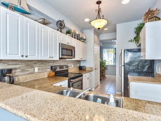 Fully Stocked Kitchen with all the Amenities! Perfect for Home Cooked Meals!
