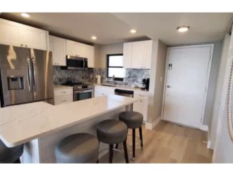 Newly remodeled kitchen, fully stocked, all stainless appliances