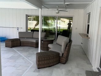 Lanai furniture, Patio door to living room, two panels open fully!