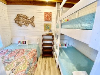 Full Size Bed and Bunk Beds (2 standard size singles) - TV yes - no closet