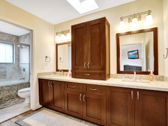 The master bath features double vanities and plenty of storage