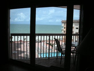 view of beach from inside the condo