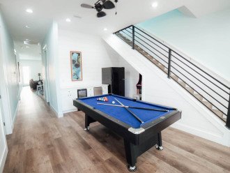 Pool table arcade game and kitchenette