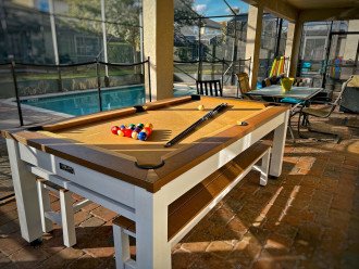Outdoor pool, ping pong, and picnic table serves all your outdoor needs
