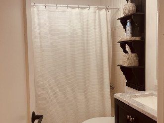 Bathroom in hallway- bathtub/shower combo