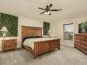 Wake up to stunning canal views in this spacious master bedroom.