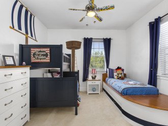 Bedroom 6 is a Pirate themed room ideal for boys or girls. It has a Pottery Barn Camp Twin-Over-Full Bunk bed and an additional twin boat bed