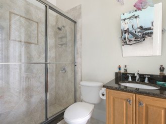 Full bathroom located in private gym