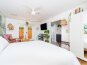 Bright and airy suite with tropical vibes