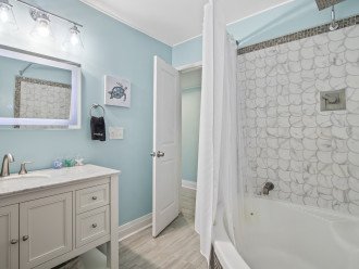 En-suite bathroom with large soaker tub