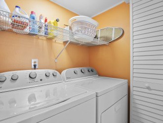 Unit offers full-sized washer & dryer, iron, ironing mat/board & laundry baskets