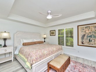 Master bedroom with king bed and tv