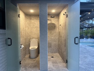 4th Bathroom - Outdoor Marble Toilet Room And Shower. Tempered Glass Privacy Doors