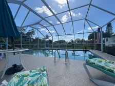 Waterfront, pool paradise with loaner car and boat options. Inclusive!