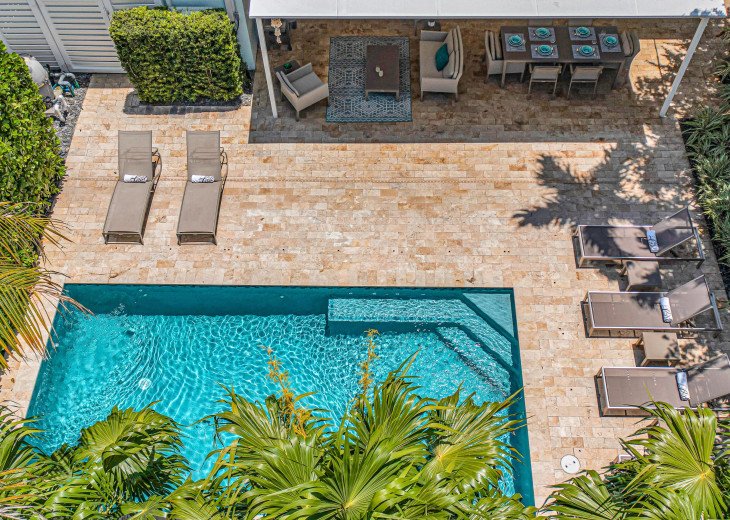 Dive into luxury and soak up the sun, just steps away from the beach in your own oasis with a heated pool.