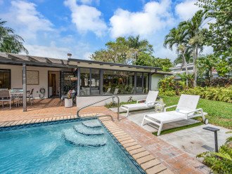 Features sunning, dining, and grilling areas with welcoming safe & easy access in-to and out-of the heated pool,
