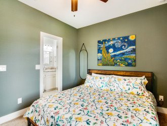 Guest bedroom with King bed, flat screen smart TV and en-suite bathroom