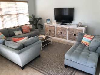 Living room, flat screen tv w/sound bar and media center (board games inside!)