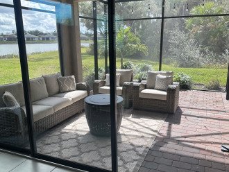 Screened in lanai with water view.