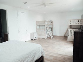 3rd floor Bunk room with queen bed, 2 bunk beds and 2 trundles