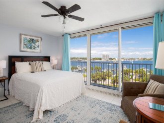 Guestroom 1 offers a queen bed and beautiful harbor views.