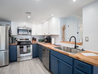 Beautifully remodeled kitchen with new stainless steel appliances.