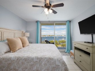 Master bedroom offers harbor views, king bed, tv and ensuite bathroom.