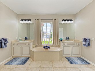 Master bath has soaker tub, separate shower, and his/her sinks