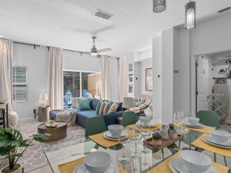 Bring the family together for memorable movie nights in the comfort of our inviting living room, complete with a generous 65" Smart TV, , while the adjacent dining area provides the perfect sp